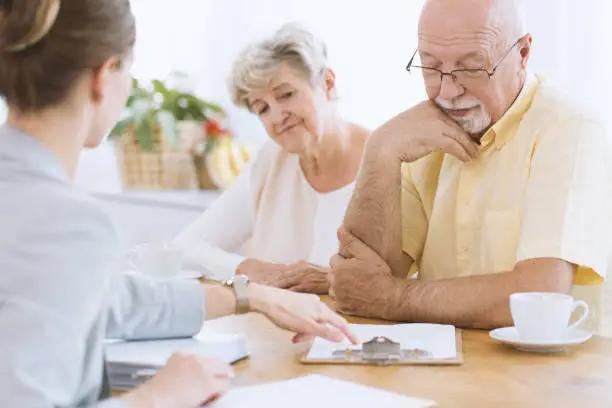 Photo of Senior people signing life insurance