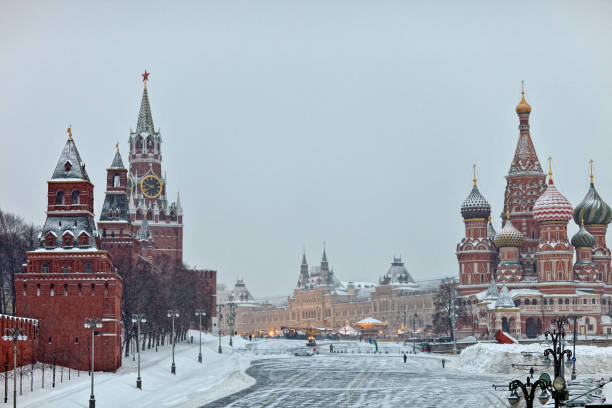 istock The Spasskaya Tower on the Red Square, GUM and St. Basil's Cathedral. 915701102