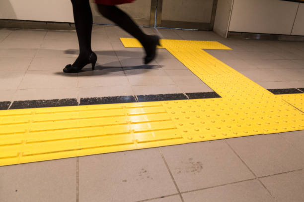 istock Indoor tactile paving foot path for blind and vision handicap 915705402