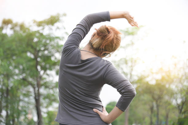 istock Asian female workout at the park. 915711586