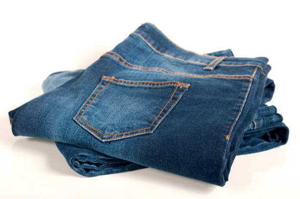 istock pair of female jeans on a white 915714460