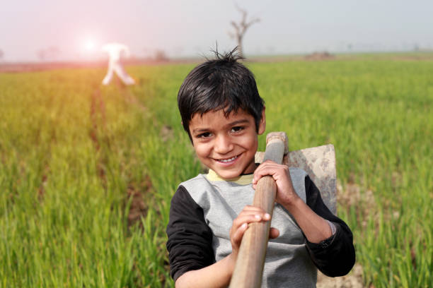 istock Little Farmer standing portrait 915716796