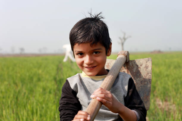 istock Little Farmer standing portrait 915716802