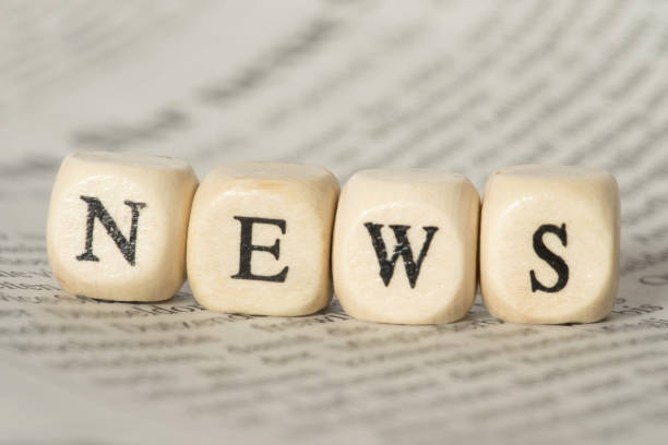 istock A newspaper and the word news 915717850