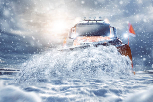 istock Professional snowplow on a snowy road 915722070
