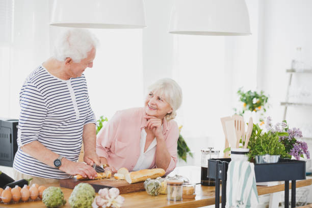 istock Wife smiling to elderly man 915723304