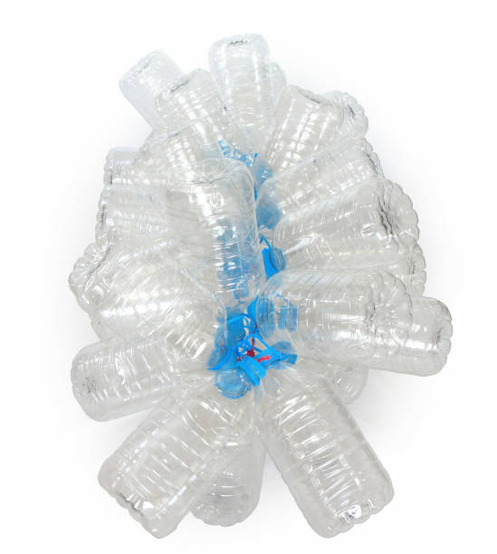 istock Group of transparent plastic empty bottles with blue cap tied with a red rope 915728114