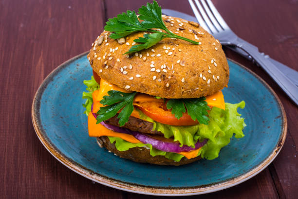 istock Warm fresh burger with meat on plate 915728536