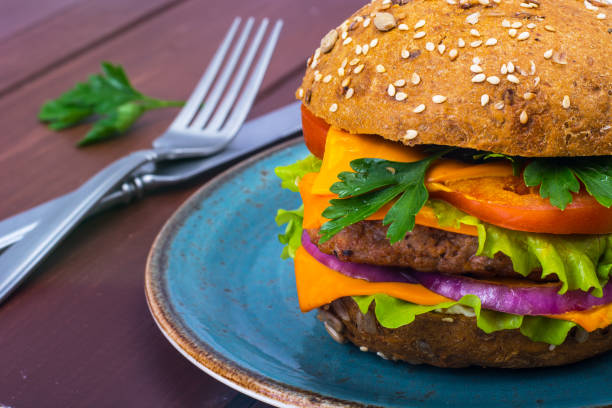 istock Warm fresh burger with meat on plate 915728694