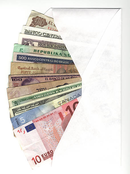 envelope com moedas internacional - argentina mexican pesos currency finance imagens e fotografias de stock
