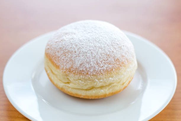 istock Sweet Polish paczek on a dessert. 915735922