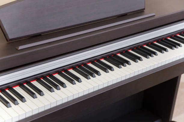 istock modern wooden black piano in music classrom isolated 915736152