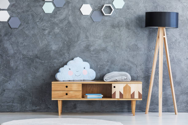 Pillow on shelf in baby room