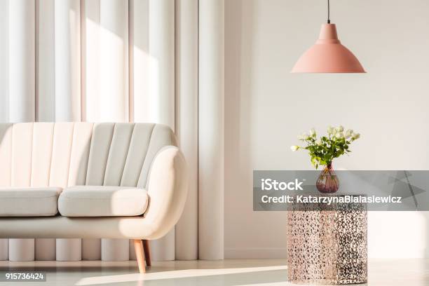 Sofa Lamp And Flowers On Table Stock Photo - Download Image Now - Electric Lamp, Pink Color, Living Room