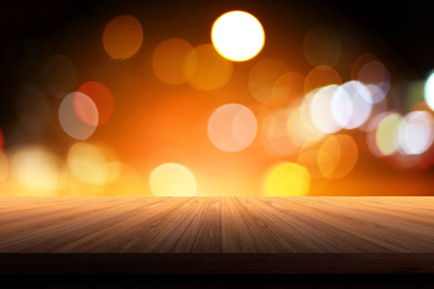 istock wooden table deck with blur bokeh background with free copy space for your text 915736606