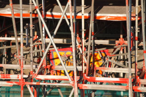 istock Colorful scaffolding made of metal on a construction site 915736864