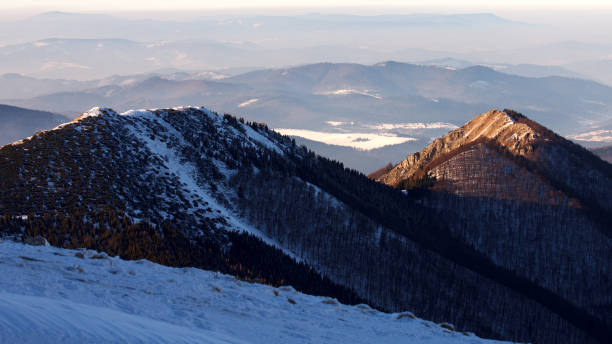 istock Snowy landscape view of hills. 915740086