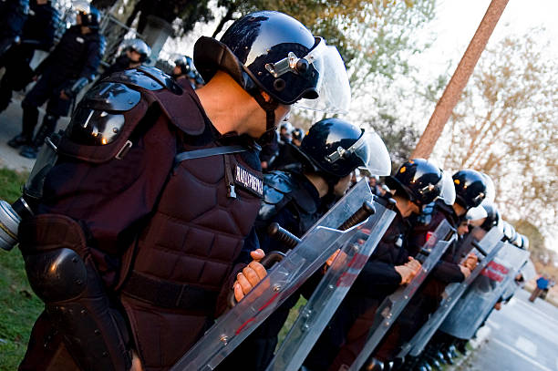 Special police forces with shield  riot shield stock pictures, royalty-free photos & images