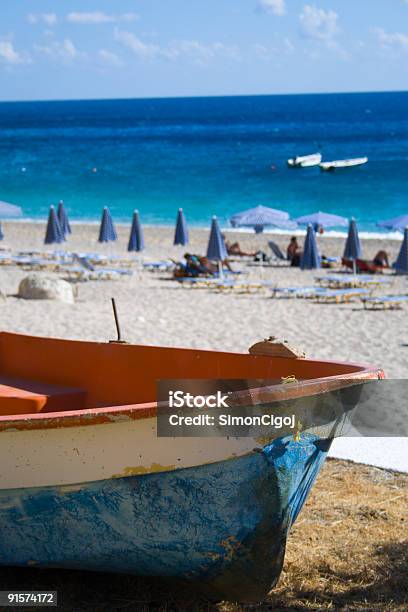 Old Boat At Kira Panagia Beach Karpathos Greece Stock Photo - Download Image Now - Beach, Blue, Cloud - Sky