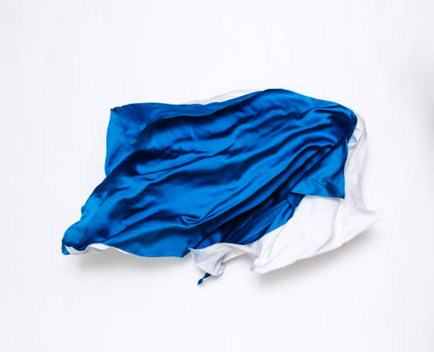 istock abstract blue and white fabric in motion 915752488