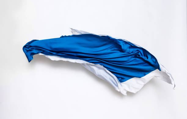 istock abstract blue and white fabric in motion 915753234