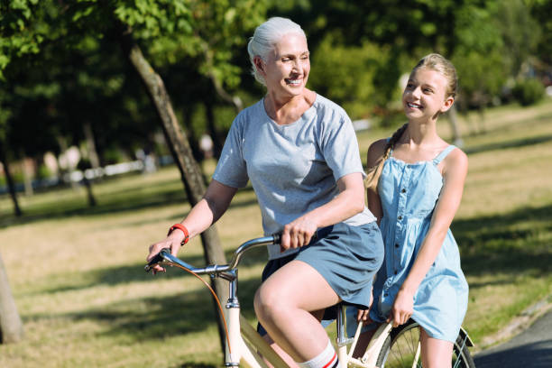 istock Cheerful elderly woman enjoying the ride 915760860