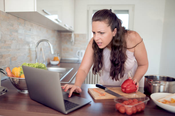 istock Woman enjoying cooking 915761104