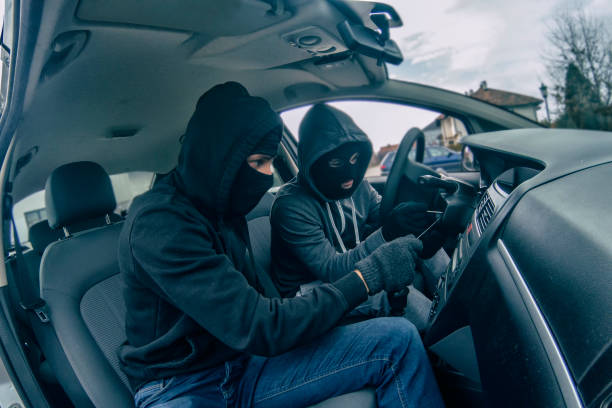 istock Car Thief tries to start the car 915770140