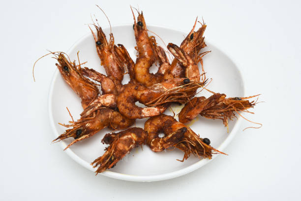 boulangerie/grillades/frites/crevettes/crevettes tigrées de barbecue populaire de fruits de mer de la zone côtière de l’inde - food rice lobster scampi photos et images de collection