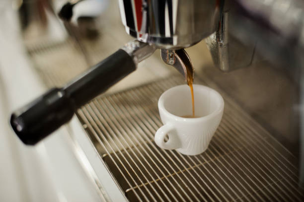 istock Professional espresso machine pouring strong looking fresh coffee 915773062