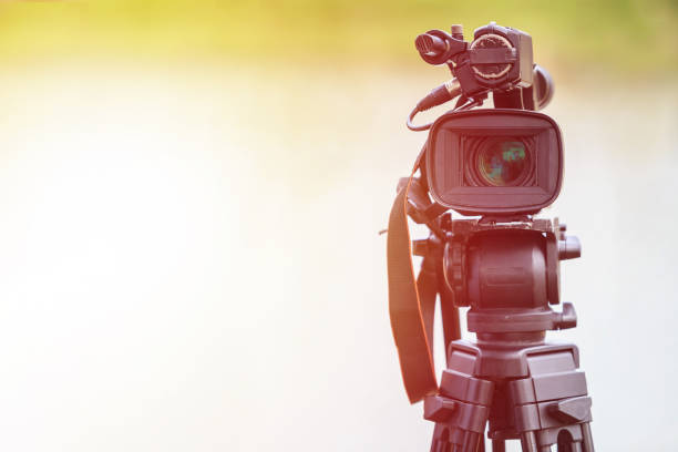 istock Professional digital video camera. Outdoor setup and working 915775666