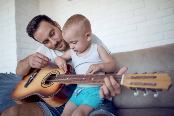 istock Father and son at home 915776820