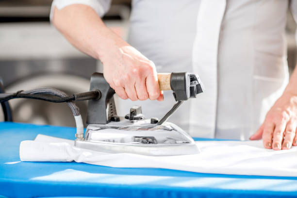istock Professional ironing in the laundry 915783664