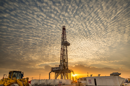 Drill rig at sunset.