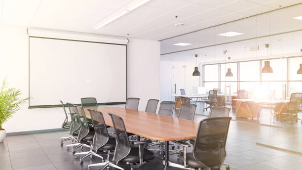 istock Office interior with large desk and blank writing board 915795338