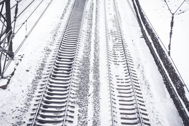 istock Railway tracks in winter 915795504