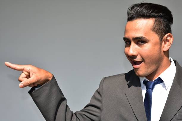 istock Business Man Pointing 915798952