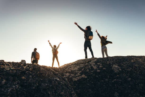 istock Friends enjoying the view from mountain top 915799852