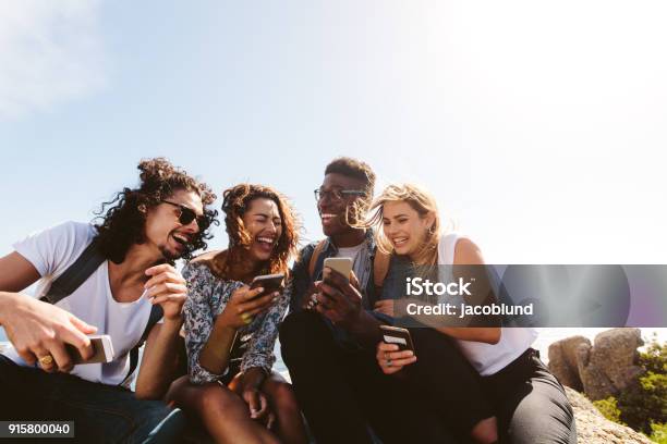 Group Of People Having Fun On Their Holidays Stock Photo - Download Image Now - Friendship, Group Of People, Young Adult