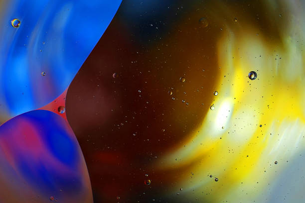 istock colorful background from water drops 915800668