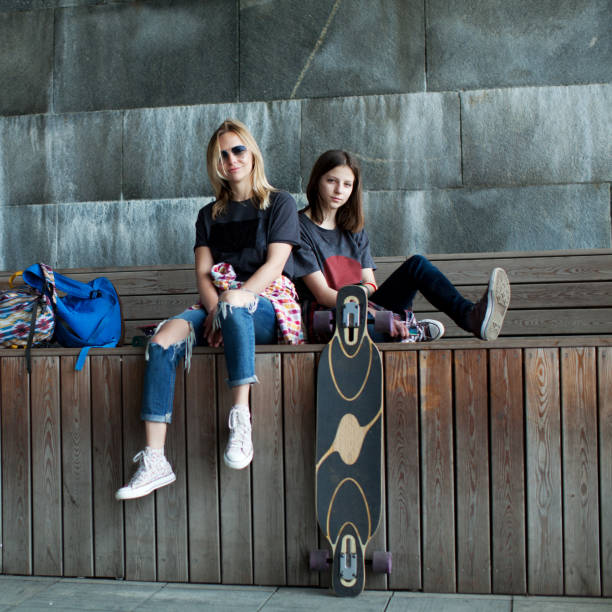 istock mother and daughter walking together 915809824