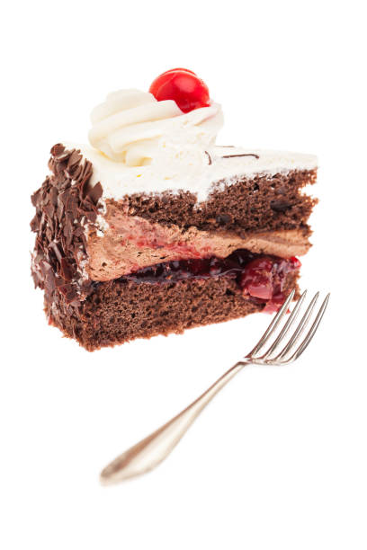 istock single piece of black forest cake with fork in front of it 915810108