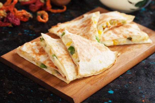 istock Mexican quesadillas with salsa and guacamole 915815496