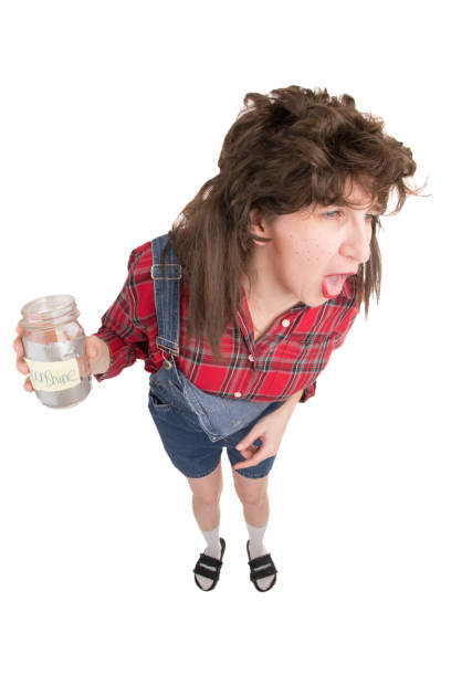 istock Fisheye Redneck Woman Gagging on Moonshine 915816096