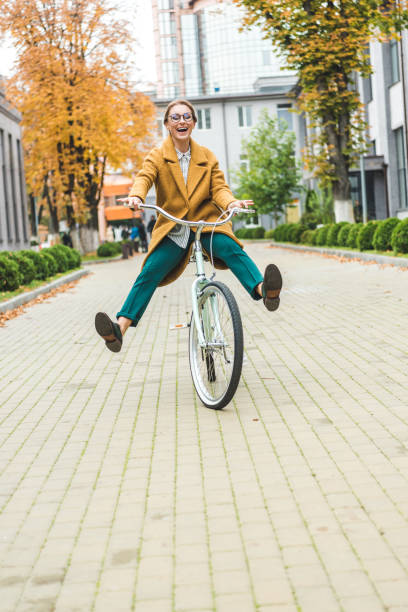 istock woman riding bike 915819220