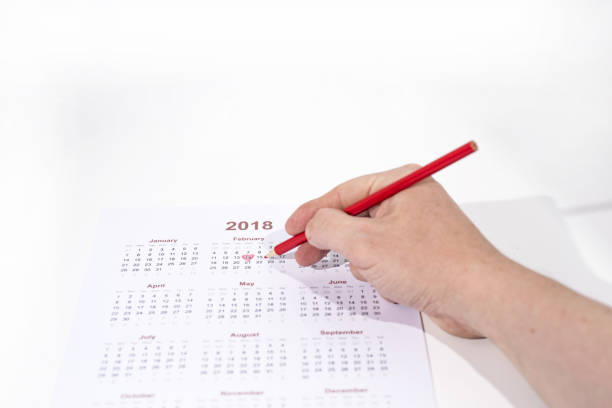 istock Valentine day abstract photo. Calendar with pencil 915825664