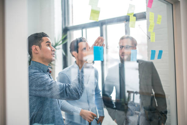 istock Young partners discussing business ideas 915827692