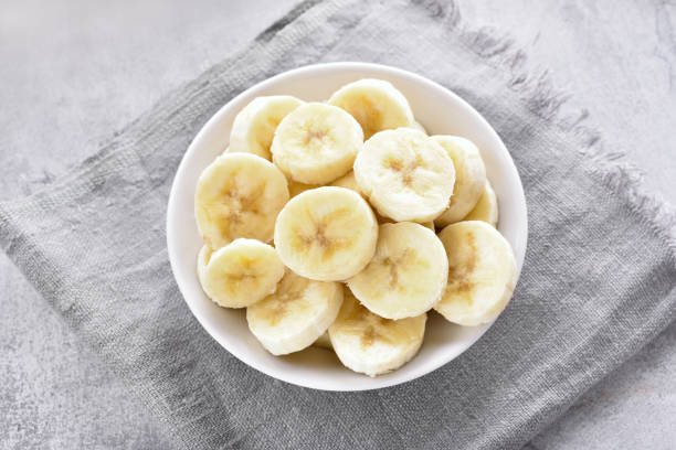 istock Banana slices in bowl 915830756