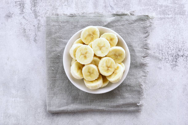 istock Banana slices in bowl 915830762