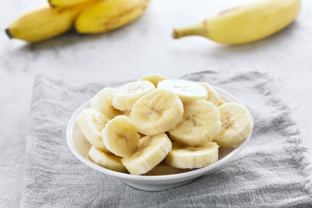 istock Banana slices in bowl 915834076